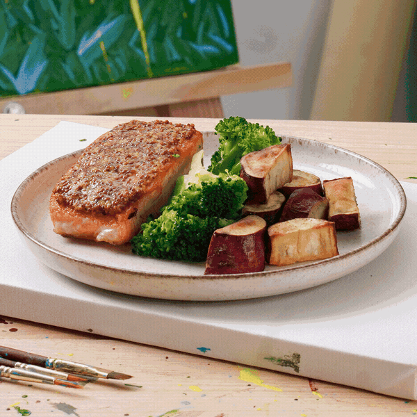 Salmão com legumes no prato, sobre uma tela pintada, animação
